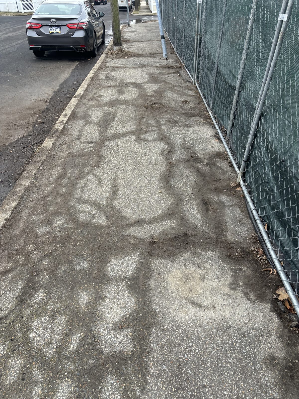 Commercial sidewalk before maintenance